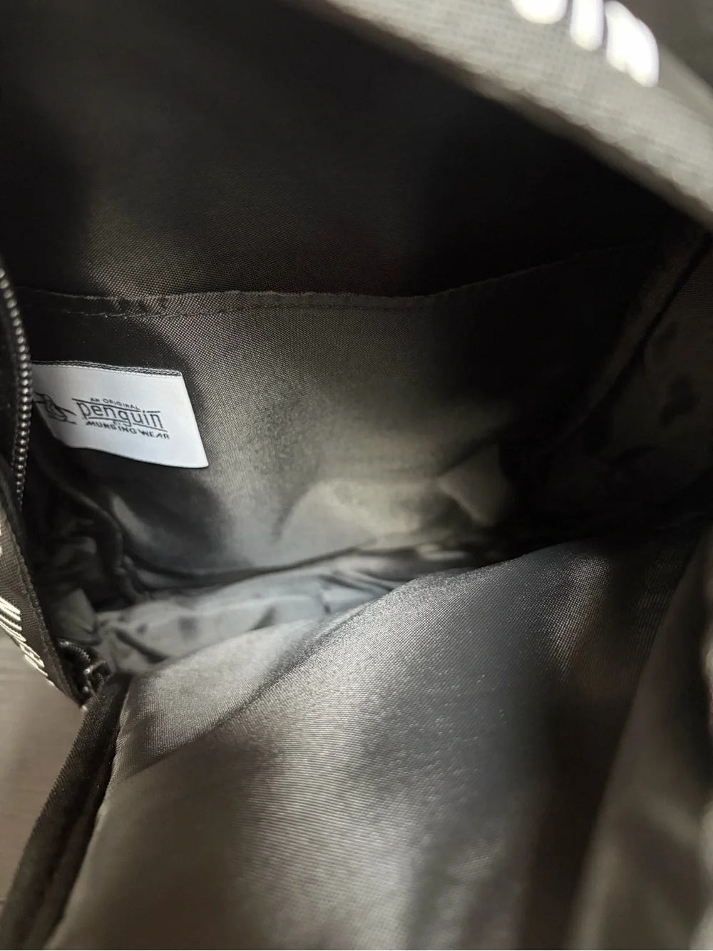 Original Penguin Black Sling Backpack with White Penguin Logo